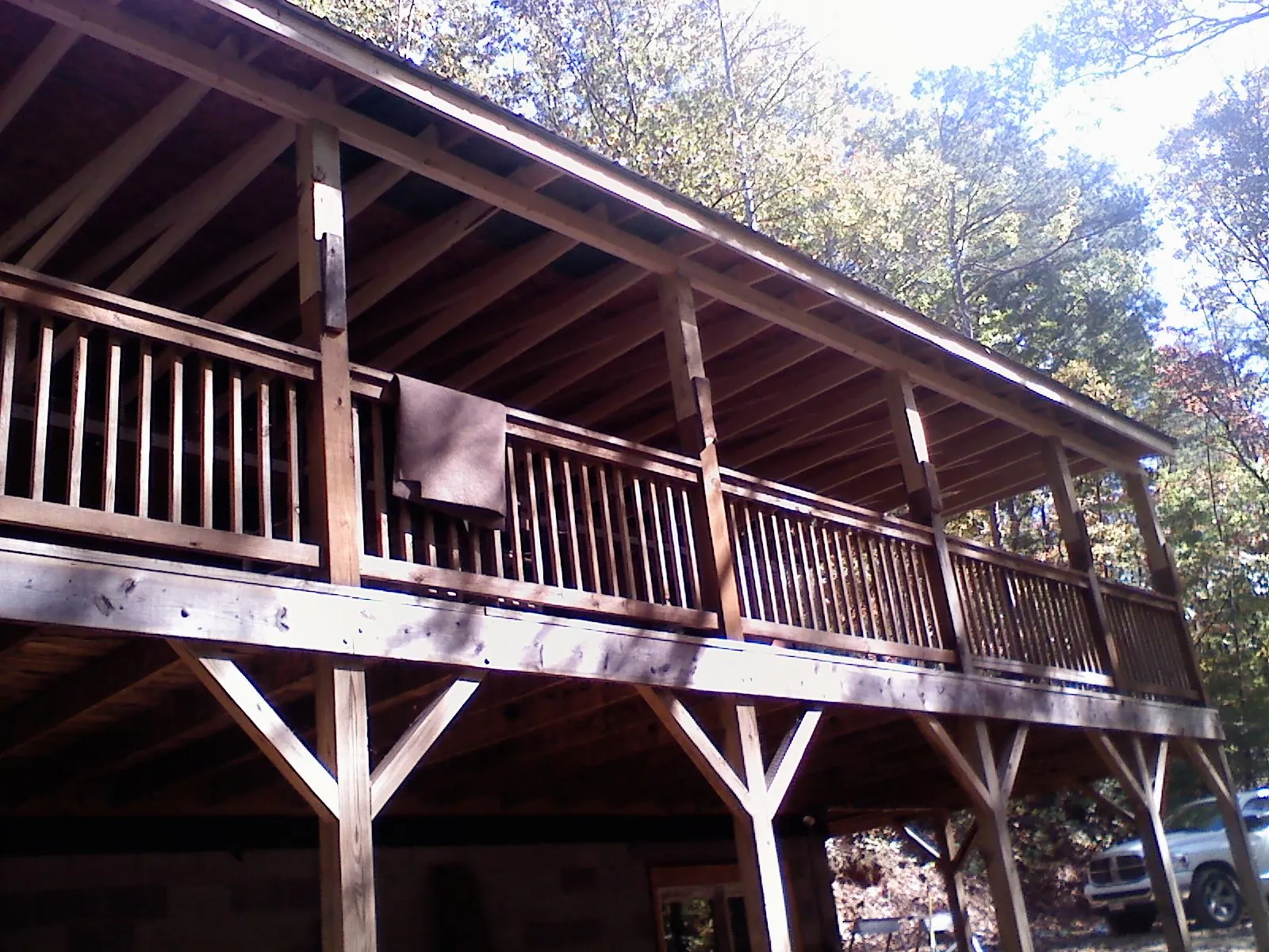 Timber framing under a new elevated porch and deck — Roof Leak Repair in Maquoketa by Roofing Brothers